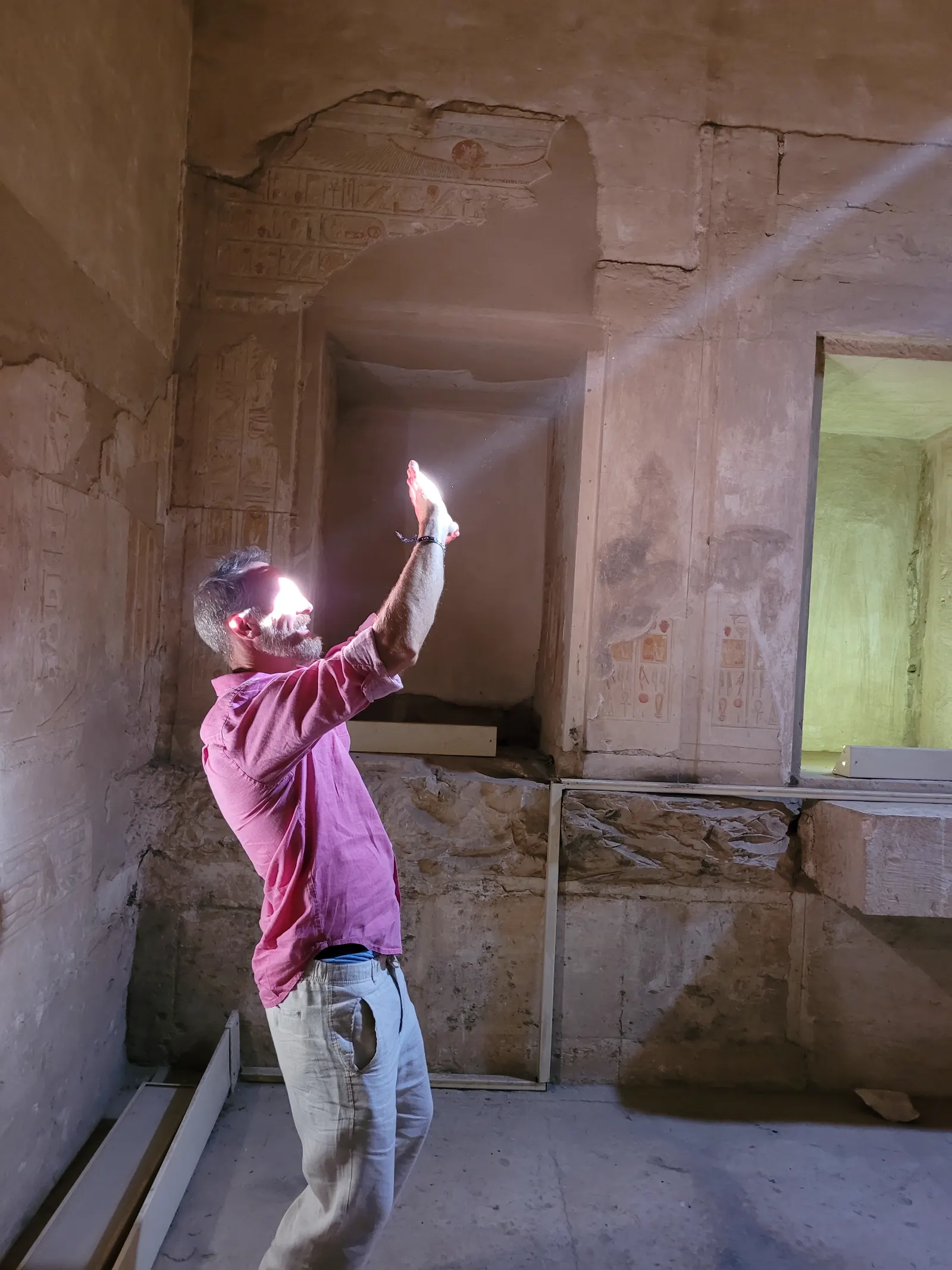 Jason in an Egyptian temple with light entering his hands